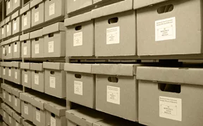 Stacked archive boxes ready for bulk document destruction