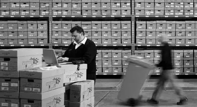 Black and White Image of Stacked Archives